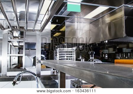 Professional kitchen view counter in stainless steel .