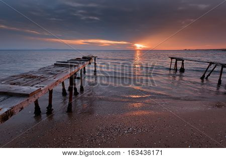Magnificent sunset with clouds and fire sun in the middle of December, at the village of Ravda, Bulgaria