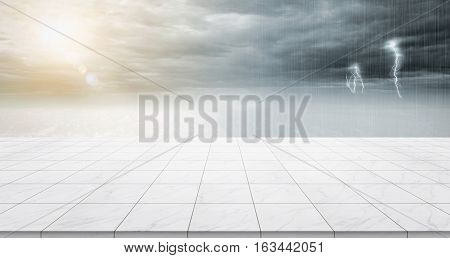 Business concept - Empty marble floor top with panoramic sky view under sunrise and storm thunder grey sky for display or montage product