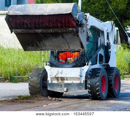 Sweeper attachments mini excavator on road maintenance