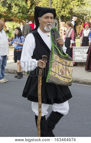 SELARGIUS, ITALY - September 8, 2013: Former marriage Selargino - Sardinia - portrait of a man of the folk group of pro-loco Senis