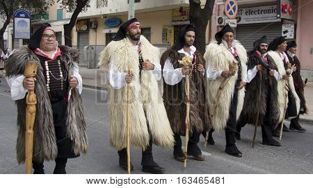 QUARTU S.E., ITALY - September 15, 2013: Wine Festival in honor of the celebration of St. Helena - Sardinia - Parade of folk group Sant'Agata of Santadi