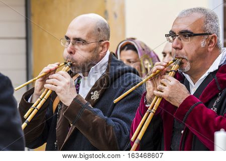 CAGLIARI, ITALY - May 1, 2014: 358 Religious Procession of Sant'Efisio - Sardinia - launeddas musicians parading in traditional Sardinian costume