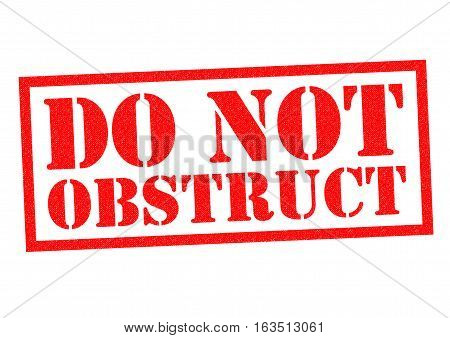 DO NOT OBSTRUCT red Rubber Stamp over a white background.