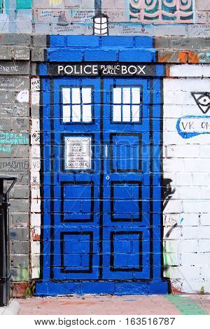 Graffiti of the traditional old-fashioned British police box
