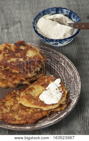 Marrow zuccini flapjack on timber board close up
