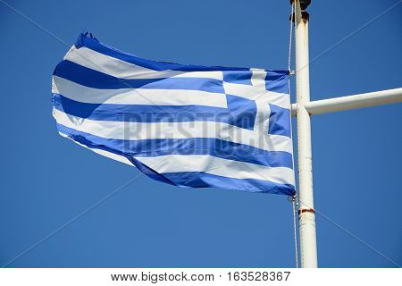 Greek flag against a blue sky Kalyves Crete Greece Europe.