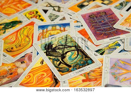 Moscow, Russia - December 4, 2016: Tarot card Devil with other cards. Rider-Waite tarot deck. Esoteric background