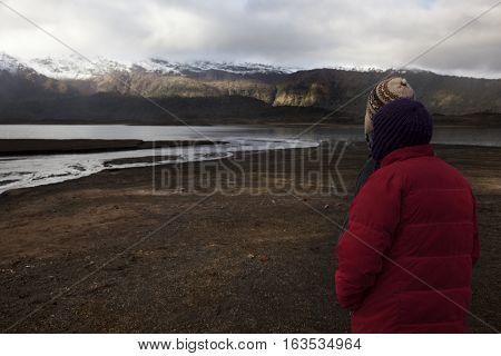 CONGUILLIO-03 MAY 2015: A couple of Chilean look the horizon and wait the sunset in the Conguillio Park near Melipeuco on May 3, 2015. Chile
