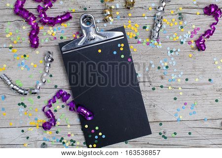 Carnival Confetti On Wood Background