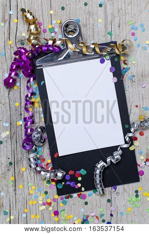 Carnival Confetti On Wood Background