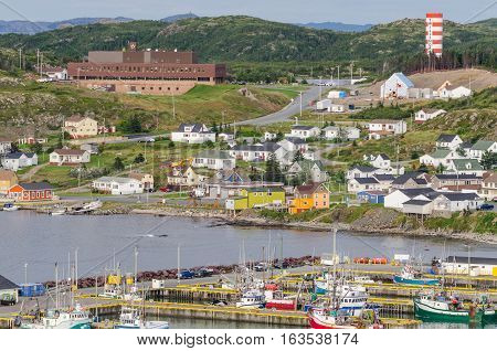 Small village community, Twillingate, Newfoundland.  Fishing boats docked along the shoreline in this coastal town, local roads connect the community along the Island's edges.
