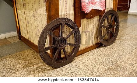 decorative wooden wagon wheel in the room
