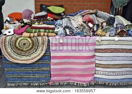 Of domestic hand-woven patchwork on a table.