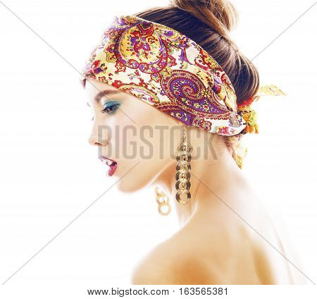 young pretty modern girl with bright shawl on head emotional posing isolated on white background, asian people ethnicity