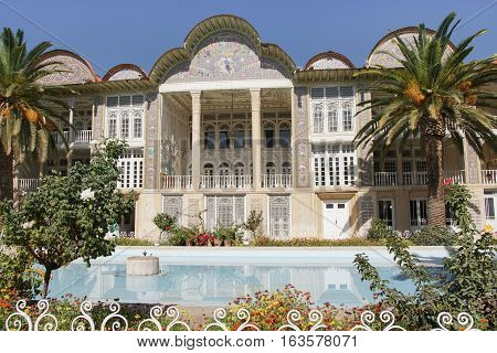 SHIRAZ, IRAN - OCTOBER 7, 2016: Beautiful palace within the Eram Garden on October 7, 2016 in Shiraz, Iran, Asia