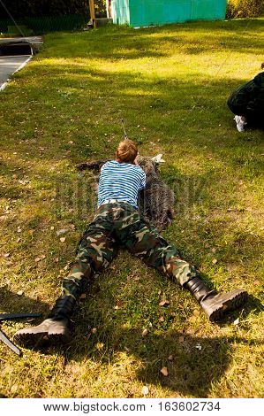 Tyumen, Russia - September 22, 2012: Miles of Fire festival of live history on basis of Avanpost center. Young man took aim with air gun