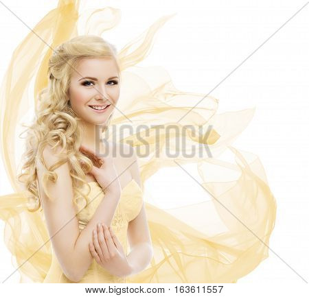 Woman Beauty Fashion Model Portrait Blond Hair Long Curls Yellow Waving Fabric over white