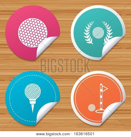 Round stickers or website banners. Golf ball icons. Laurel wreath winner award sign. Luxury sport symbol. Circle badges with bended corner. Vector