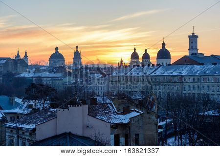 Morning Lviv sunrise. View of the central part of the city and churches: St. Michael's Ukrainian Catholic Church Church of the Holy Communion Korniakt Tower Armenian cathedral Transfiguration Church Lviv city council.