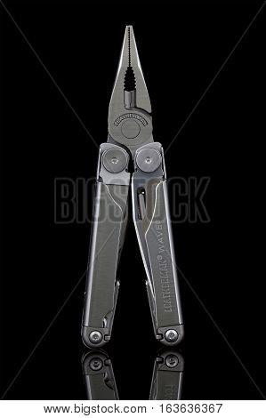 SWINDON UK - DECEMBER 30 2016: Leatherman Wave multitool on a black background