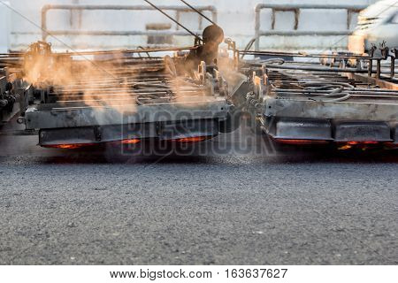 Serface Heater Machine Working On Asphalt Road