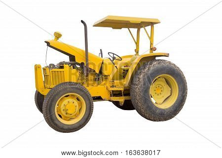 The Old Yellow Tractor Isolated On White Background