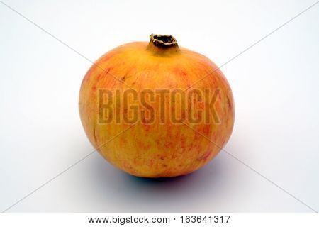 Pomegrenate fruit isolated on a white background
