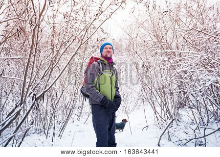 Bearded Man Hiker With A Small Dog