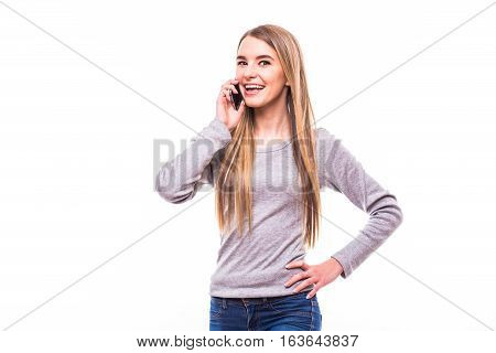 Happy blonde girl speak on phone white