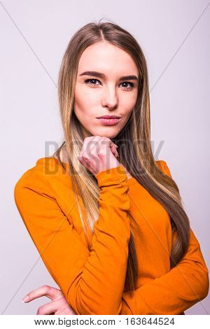 Happy Blonde Girl In Orange T-shirt On White