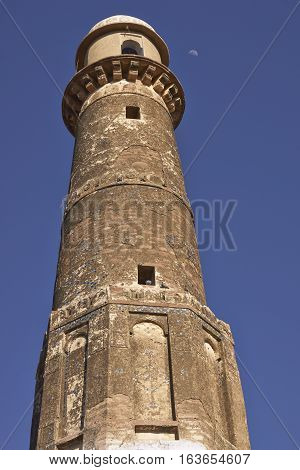 NAGAUR, RAJASTHAN, INDIA - FEBRUARY 14, 2008: Minaret of a historic mosque in the desert city of Nagaur in Rajasthan, India.