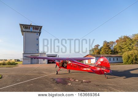 Bremgarten, Germany - October 22, 2016: A classic red Cessna 170 aircraft parked at the airport