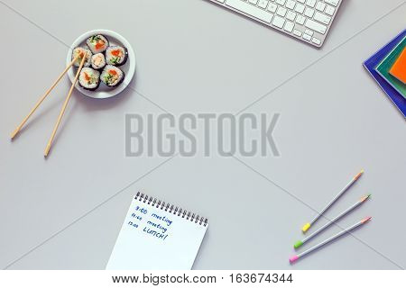 Top View Office Work Place On Grey Desk Sushi Schedule