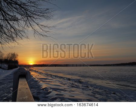 Late sunrise at Kostroma city on Volda river shore