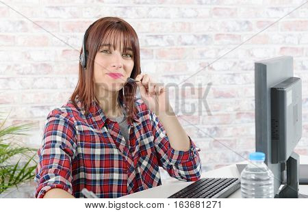 cheerful beautiful young support phone operator with headset
