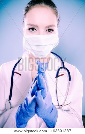 Portrait Of Female Doctor In Mask