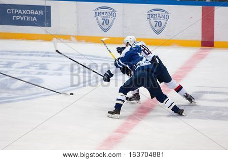 MOSCOW RUSSIA - OCTOBER 12 2016: T. Kubalik (81) vs D. Tarasov (79) on hockey game Dynamo Moscow vs Slovan Bratislava on Russia KHL championship. Slovan won 5:3