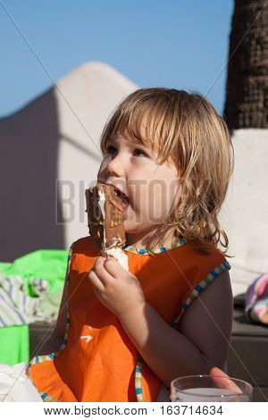 Child Eating Popsicle Ice Cream Looking