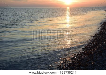 Sunset over the sea in the Bay of Imereti. Sochi Russia