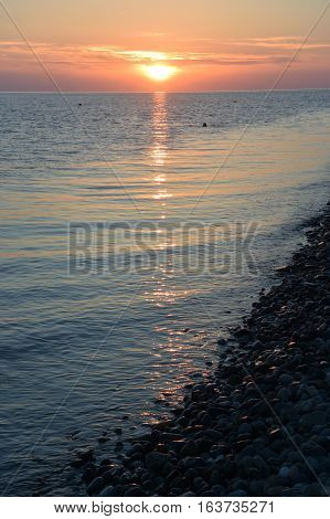 Sunset over the sea in the Bay of Imereti. Sochi Russia