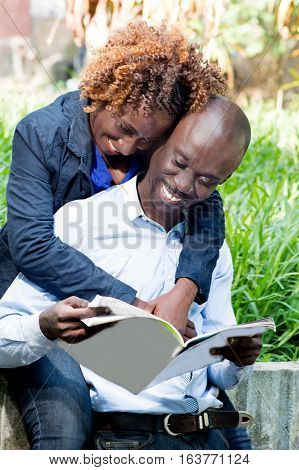 This young couple is happy to be together that day in the park.
