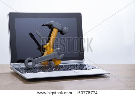 Laptop Repair And Maintenance Concept