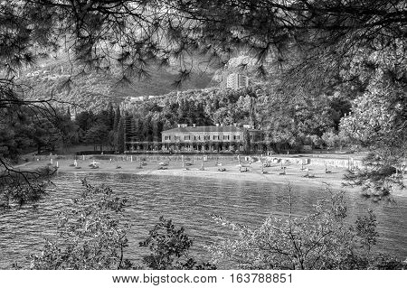 Sveti Stefan Montenegro - August 24 2015: Milocher hotel in Montenegro near Sveti Stefan. King and Quine beach. Vintage black and white