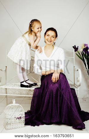 young mother with daughter at luxury home interior vintage, old fashion relashionship family