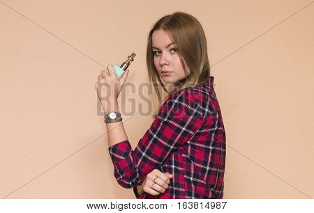 vape girl in the red shirt smoking electronic cigarette