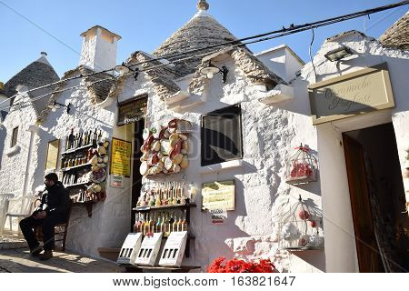ALBEROBELLO, APULIA, ITALY - JANUARY 02, 2017 - Shop selling typical local products inside the traditional trulli houses