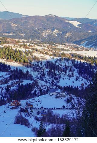 View from the mountain to the ski base and ski lift. Carpathian mountains. Slavske
