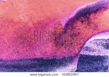 Colorful sand pigments falling down in water. Abstract landscape background.