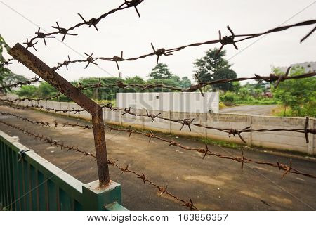 Barbed wire fence at Kariadi General Hospital photo taken in Semarang Indonesia java